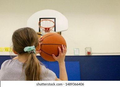 Playing Basketball In PE Class