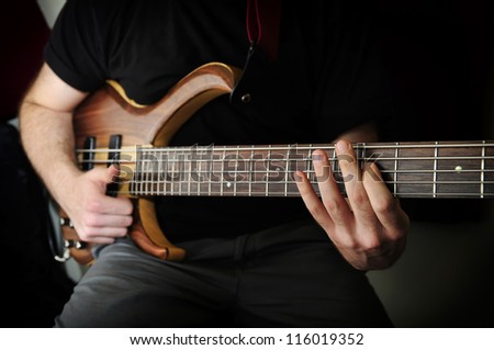 Playing Bass Guitar