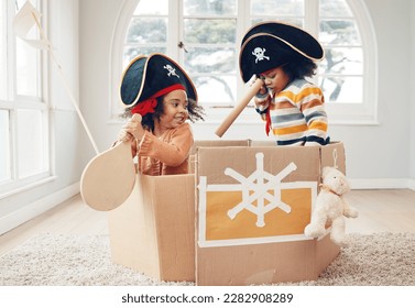 Playing, box ship and pirate kids role play, fantasy imagine or pretend as yacht captain in cardboard container. Creative sailor, fun home game or sailing black children on Halloween cruise adventure