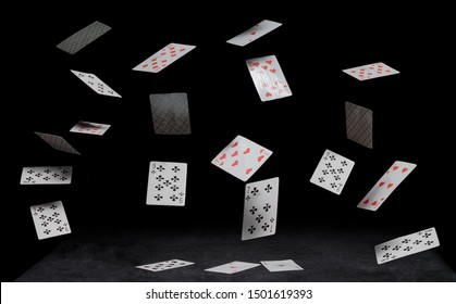 playing cards fall on a black table - Shutterstock ID 1501619393