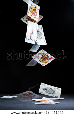 Playing cards falling