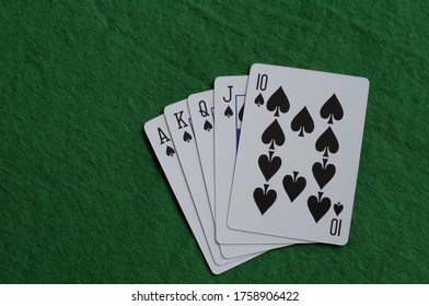 Playing Cards: Royal flush poker hand in spades.