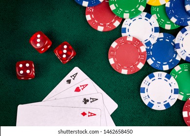 Playing Cards,dices And Poker Chips From Above On Green Poker Table