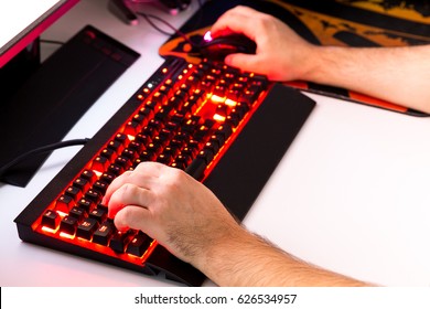 Playing computer game with gaming gear. - Shutterstock ID 626534957