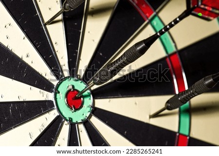 playing darts hobby, leisure, friends, fun, sports and recreation