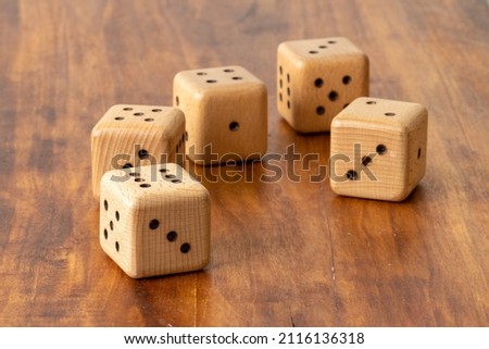 Playing dice handmade. A dice is a dice with six faces marked with numbers from 1 to 6. 