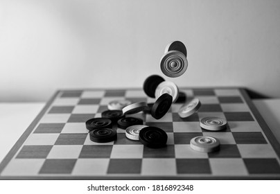 Playing Draughts - Black And White Image