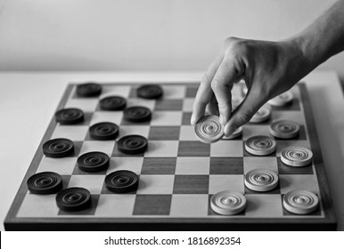 Playing Draughts - Black And White Image