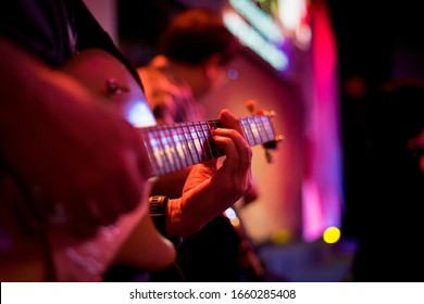 Playing Electric Guitar On Stage