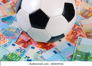 Playing field of paper euro notes and leather soccer ball - Powered by Shutterstock