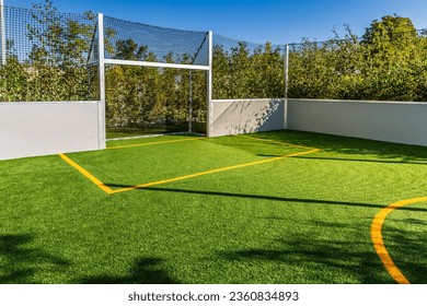 Playing field for small garden with artificial lawn, synthetic turf playing field, artificial grass pitch - Powered by Shutterstock