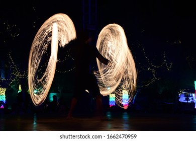 Playing with fire during a dance performance in an event