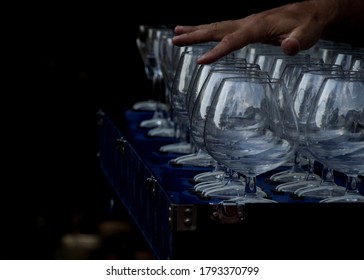 Playing A Glass Harp With A Hand