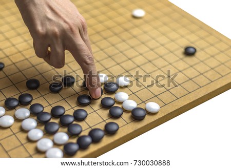 Playing Go or Igo. Isolate white background