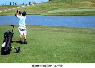 playing golf