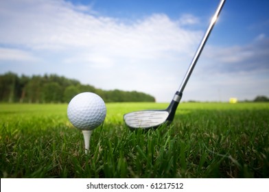 Playing Golf. Golf Club And Ball. Preparing To Shot