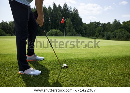 playing golf on a golf course