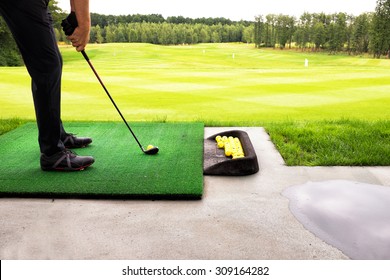 playing golf on a golf course in cloudy weather