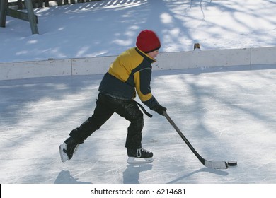 Playing Ice Hockey On An Outdoor Ice Rink