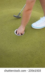 playing mini-golf