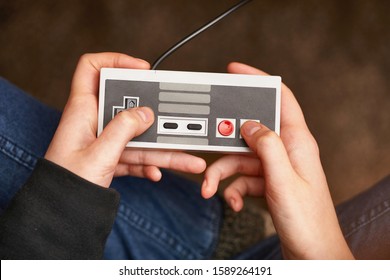 Playing Old Video Game Console