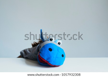 playing puppet on the white background. reaction. Emotional. Hippopotamus.