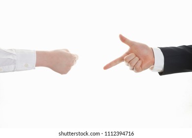 Playing Rock Paper Scissors On White Background