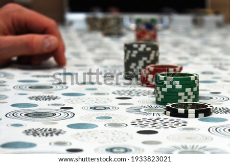 Playing token on the table during the poker game playing