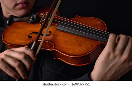 Playing Viola With Bow Closeup