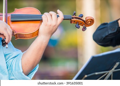 Playing Violin Music