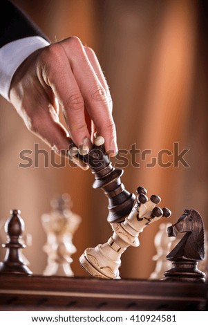 playing wooden chess pieces, close-up.