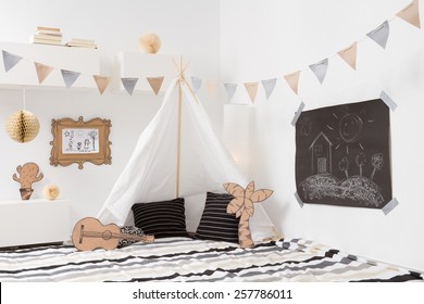 Playroom For Kids With Teepee And Garlands