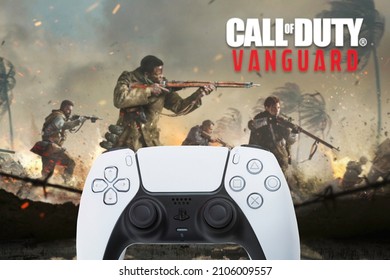 Playstation 5 Dual Sense Controller with Call of Duty Vanguard game blurred in the background. Rio de Janeiro, RJ, Brazil. October 2021.