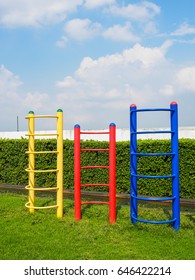 playstructure and playground in park with deep blue sky