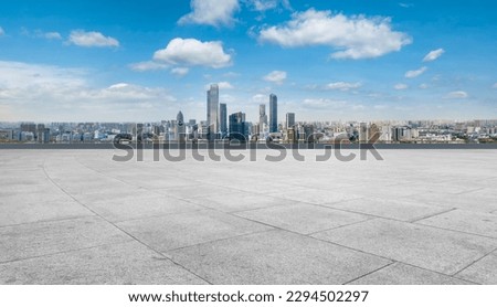 Plaza floor tiles and urban building group background Сток-фото © 