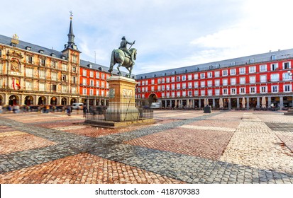 Plaza Mayor with statue of King Philips III in Madrid, Spain - Shutterstock ID 418709383
