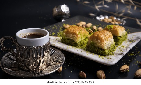A pleasant break with pistachio baklava and Turkish coffee. Baklava with pistachios, one of the most popular flavors of Turkish cuisine. Combining the flavor of pistachios with Turkish coffee.