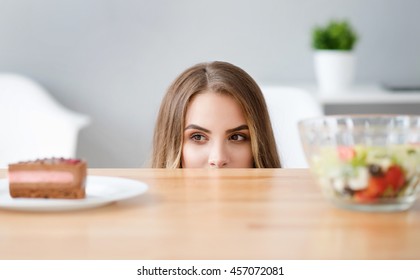 Pleasant Crafty Woman Choosing What To Eat