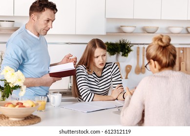 Pleasant Family Discussing Problems