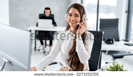 Pleasant female woman in white uniform and white headset ready to ask: 