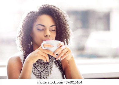 Pleasant Girl Drinking Coffee