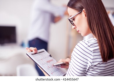 Pleasant Woman  Holding Calendar 