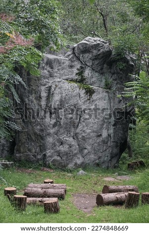 Pleasantville, New York, USA: 600 million year old gneiss rock in Rockefeller State Park Preserve, one of the largest glacial erratics in the US, at almost 20 ft. high and 65 ft. in circumference.