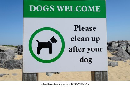 Please Clean Up After Your Dog Sign On The Beach UK