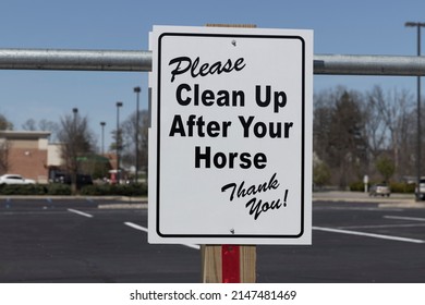 Please Clean Up After Your Horse Sign At A Local Strip Mall.