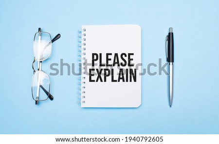 PLEASE EXPLAIN words in white notepad, pen and glasses on blue background. Concept