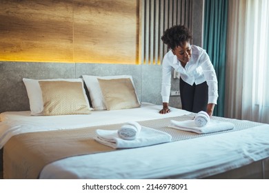 Please make up my room. Maid cleaning the room with please make up my room sign on the door. Opened door of hotel room in morning.Hotel, door open. Clean and elegant accommodation service.