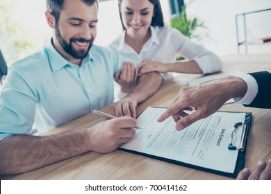 Please Sign Here. Happy Couple Is Buying New House, Lawyer Is Presenting Contract To Sign, They Are In His Office, Cheerful And Well Dressed