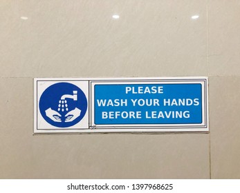 Please Wash Your Hands Before Leaving Sign Stick To The Ceramic Wall. 