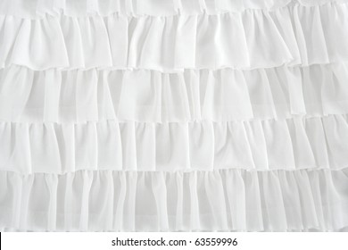 pleated skirt fabric fashion in white closeup detail macro